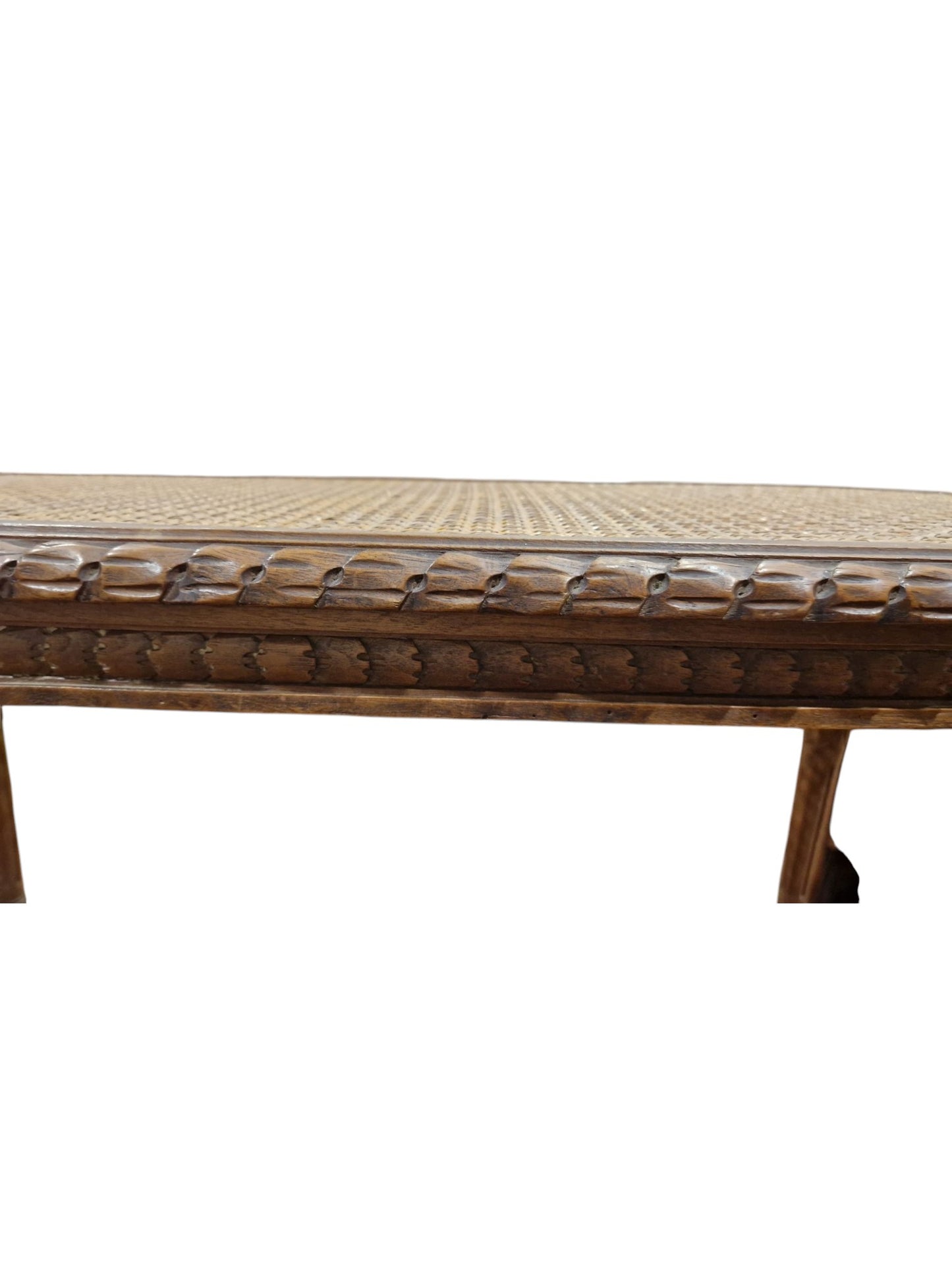 French walnut oval window seat in the Louis XVI-style with cane panel seat, carved frieze and raised