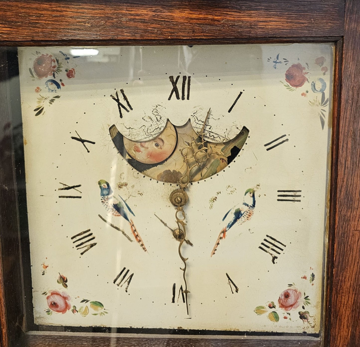 Early 20th century oak cased 8-day mantel clock, the gilt brass and silvered face having Arabic