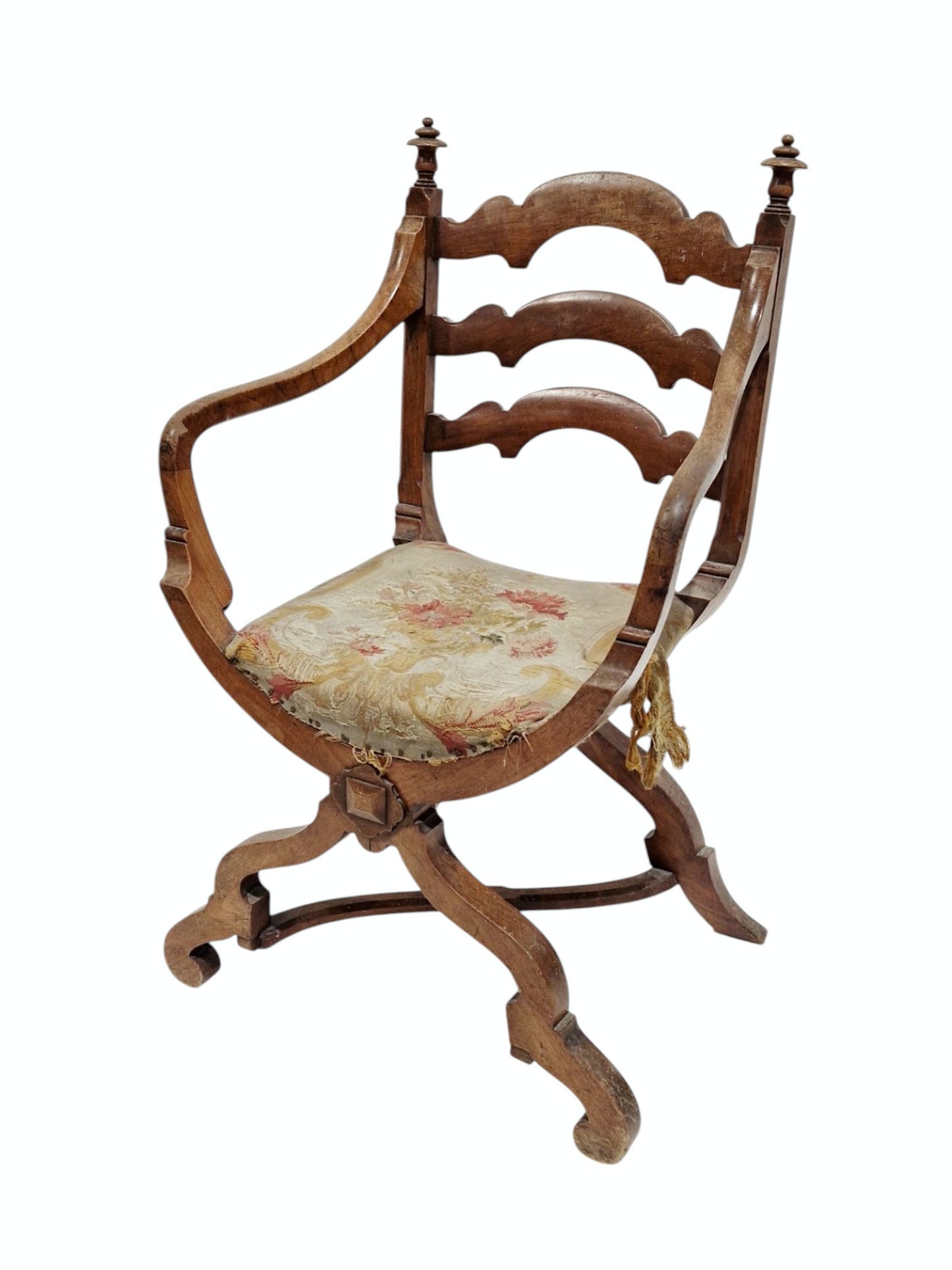 Victorian walnut Gothic Revival open armchair in the manner of Gillows, with shaped ladderback