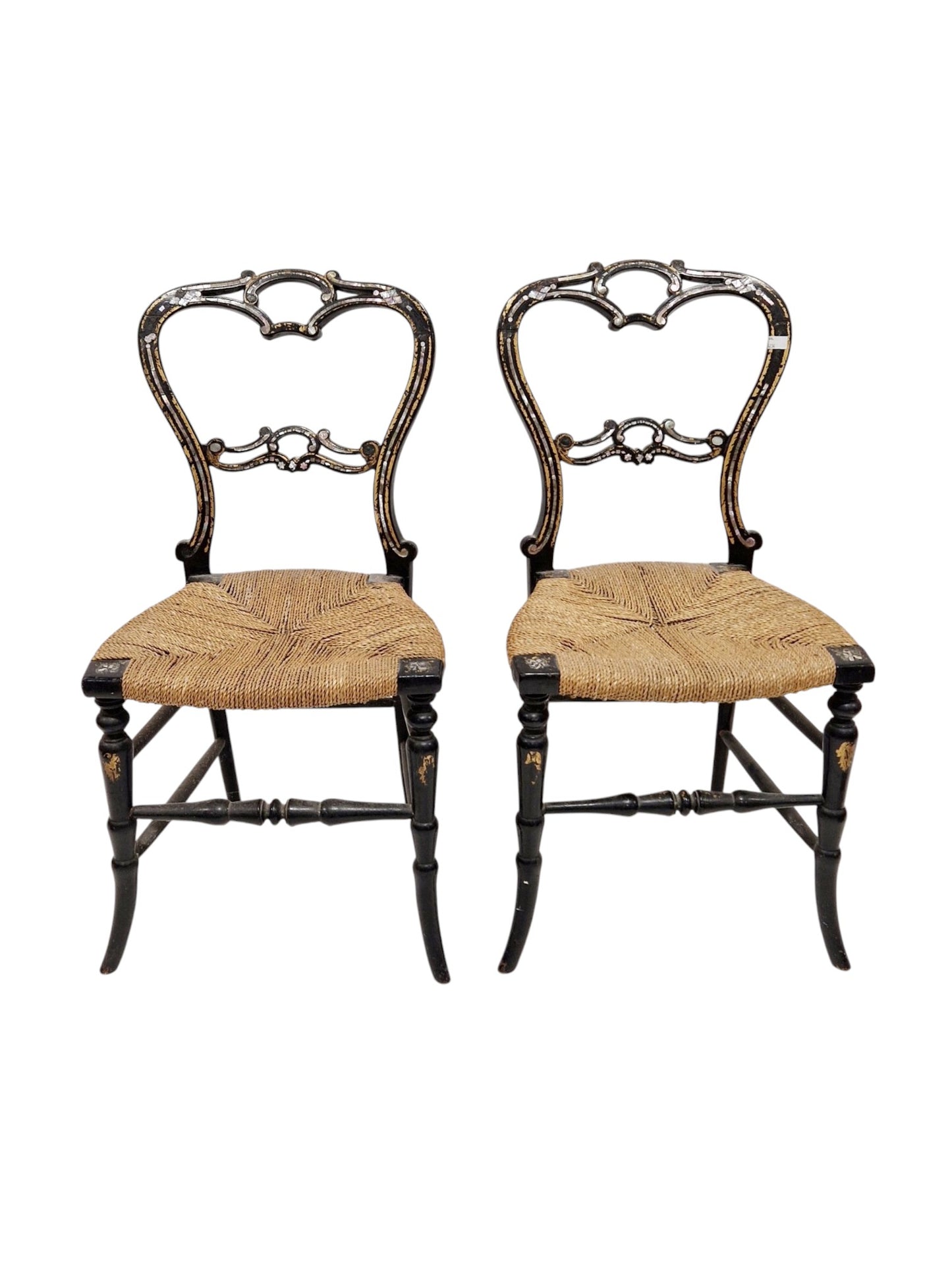 Pair of Victorian black lacquered bedroom chairs with gilt and mother-of-pearl decoration and rush